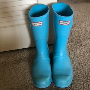 Blue Hunter boots with matching socks.